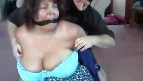 BBW bent over, tied, gagged and...